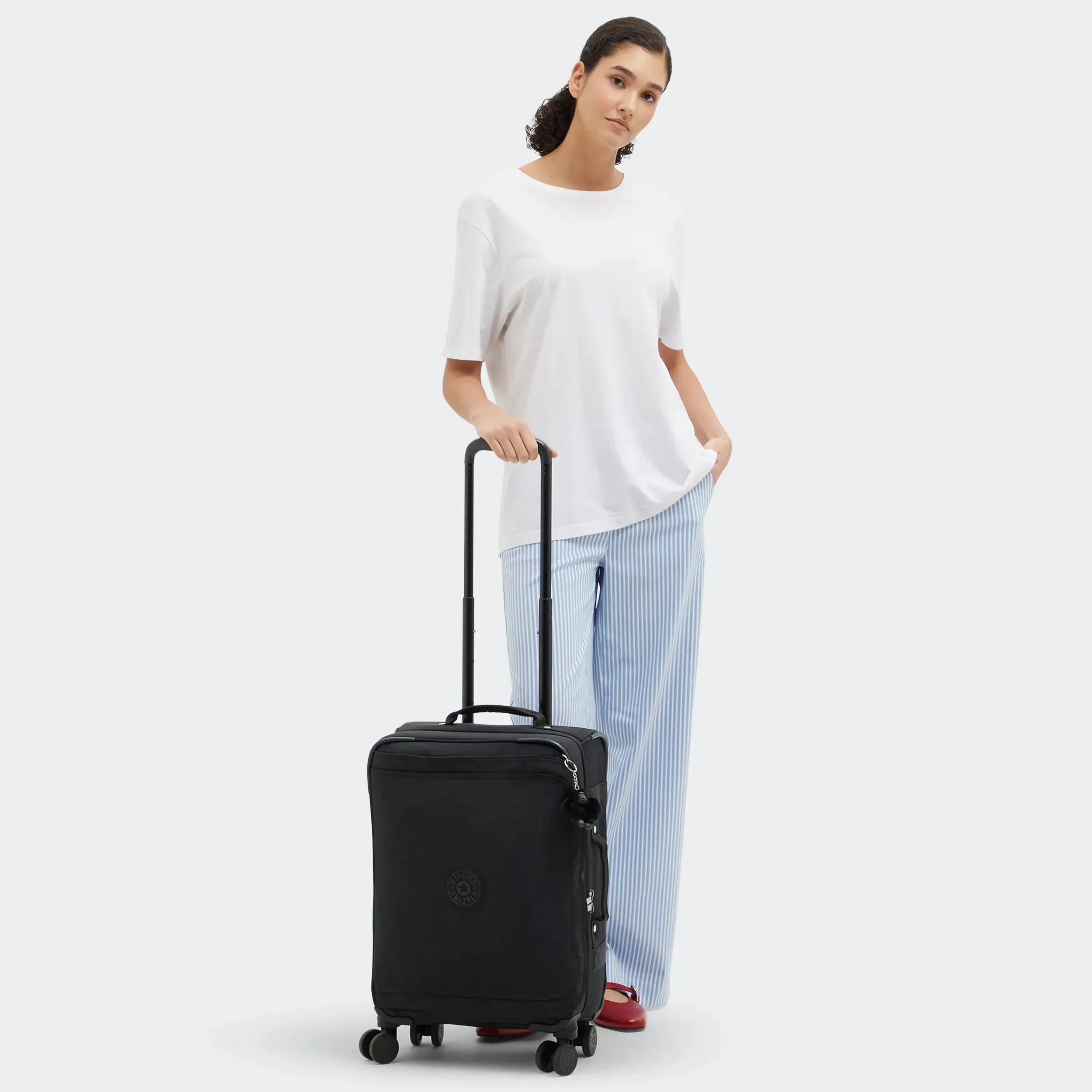 Valise souple compacte à roulettes